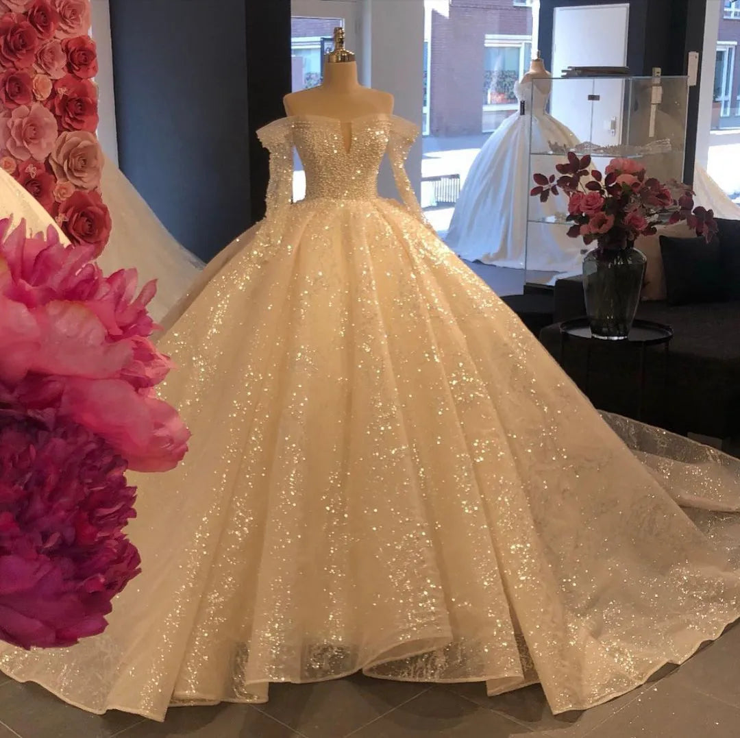 Glitter Sequins Tulle Long Sleeves Off The Shoulder Ball Gown Wedding Dresses Pearls Custom Luxury Bridal Dress Vestido De Novia Glitter Sequins Tulle Long Sleeves Off The Shoulder Ball Gown Wedding Dresses Pearls Custom Luxury Bridal Dress Vestido De Novia